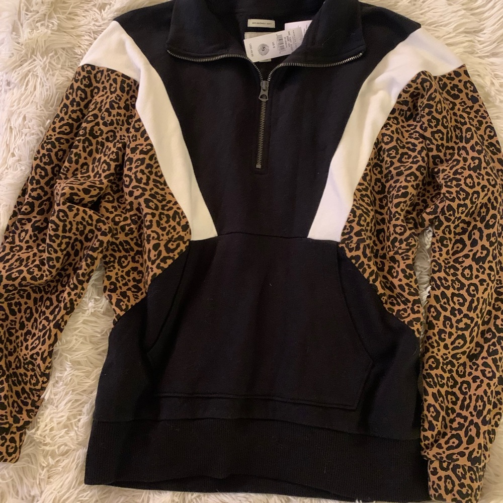 Pull over with little zipper . Brand new